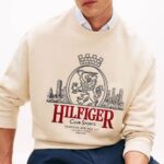TOMMY HILFIGER MEN'S HERITAGE CREST EMPROIDERY RELAXED SWEATSHIRT  IVORY PETAL - Image 3